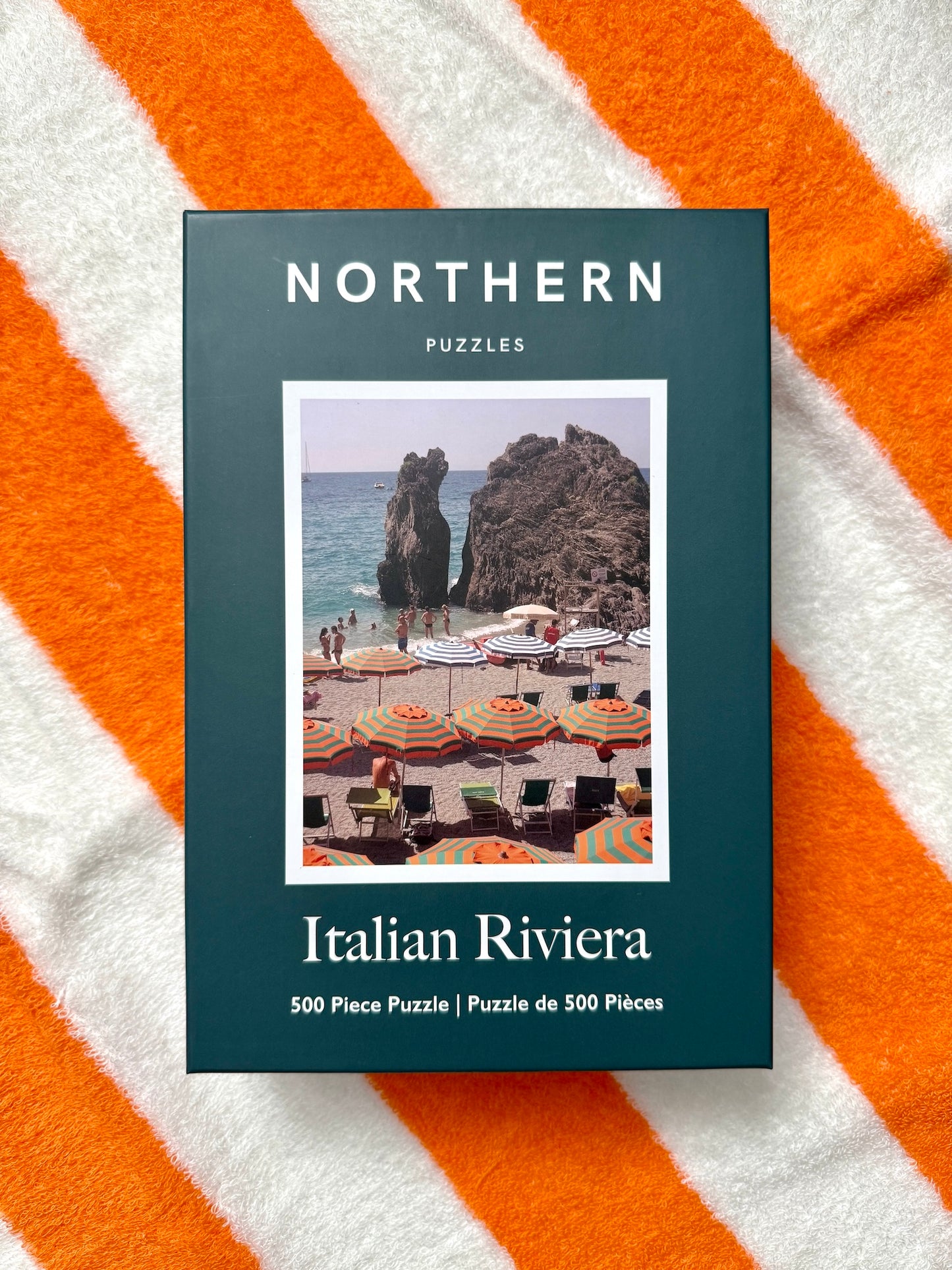 Puzzle box titled 'Italian Riviera' by Northern Puzzles on a striped background